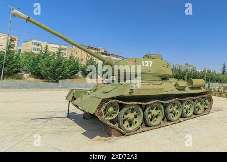 Royal Tank Museum, Amman, Jordan - May 4, 2024: Detailed view of the iconic T-34 Soviet heavy tank, displayed outdoors at the Royal Tank Museum in Stock Photo