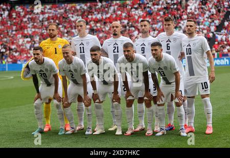 Munich, Germany. 20th June, 2024. Starting players of Slovenia line up for photos before the UEFA Euro 2024 Group C match between Slovenia and Serbia in Munich, Germany on June 20, 2024. Credit: Philippe Ruiz/Xinhua/Alamy Live News Stock Photo