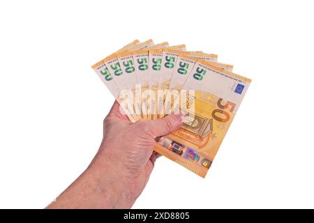 Closeup of male hand holding fifty euro notes on isolated on white background. Stock Photo