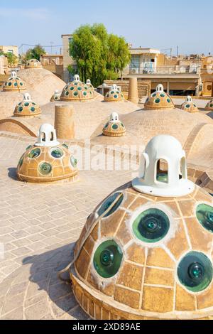 Beautiful domes with convex glasses on scenic roof of Sultan Amir Ahmad Bathhouse in Kashan, Iran. Traditional Iranian public bathhouse. Stock Photo