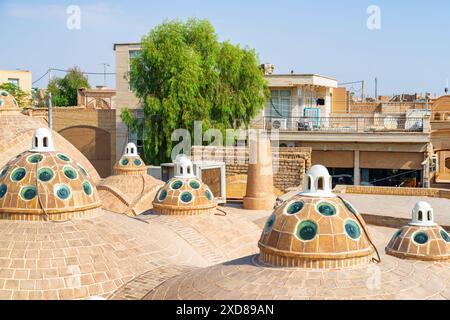 Beautiful domes with convex glasses on scenic roof of Sultan Amir Ahmad Bathhouse in Kashan, Iran. Traditional Iranian public bathhouse. Stock Photo