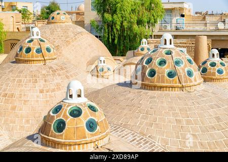 Beautiful domes with convex glasses on scenic roof of Sultan Amir Ahmad Bathhouse in Kashan, Iran. Traditional Iranian public bathhouse. Stock Photo