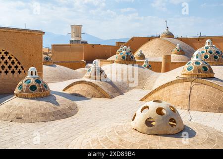 Beautiful domes with convex glasses on scenic roof of Sultan Amir Ahmad Bathhouse in Kashan, Iran. Traditional Iranian public bathhouse. Stock Photo