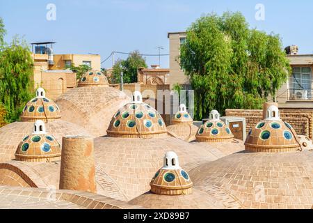 Beautiful domes with convex glasses on scenic roof of Sultan Amir Ahmad Bathhouse in Kashan, Iran. Traditional Iranian public bathhouse. Stock Photo