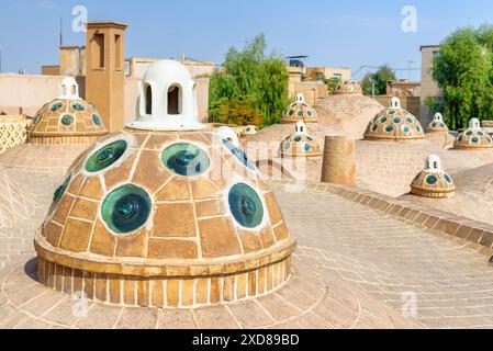 Beautiful domes with convex glasses on scenic roof of Sultan Amir Ahmad Bathhouse in Kashan, Iran. Traditional Iranian public bathhouse. Stock Photo