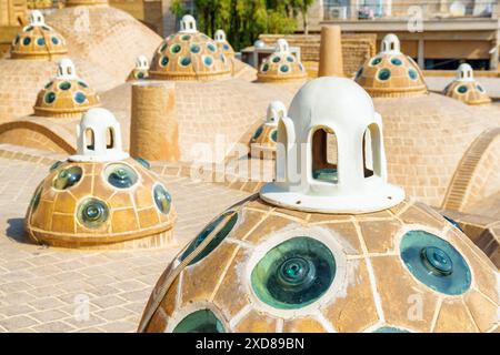 Beautiful domes with convex glasses on scenic roof of Sultan Amir Ahmad Bathhouse in Kashan, Iran. Traditional Iranian public bathhouse. Stock Photo