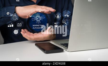 Marketing automation concept, Businessman touching marketing automation on virtual screen for digital marketing automation strategy, social media, cus Stock Photo