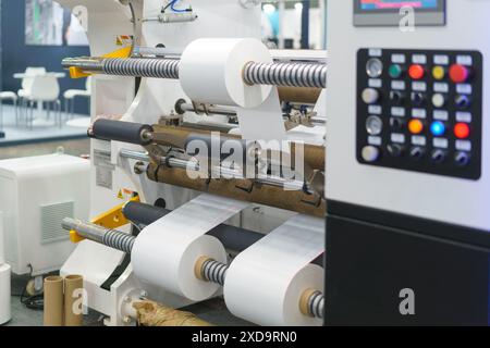 Industrial slitter rewinder machine, a critical piece of equipment in the converting industry Stock Photo