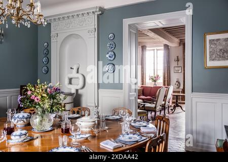 View through doorway from dining in renovated stone-built hotel particulier dating from 1770 in Saulieu, Burgundy, France. Stock Photo