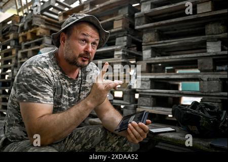 DONETSK REGION, UKRAINE - JUNE 12, 2024 - Servicemen are part of a BM ...