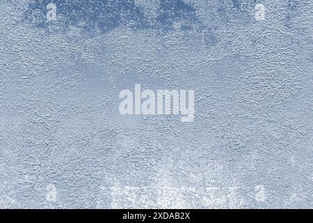Abstract textured wall with a gradient of gray and blue, rough surface Stock Photo