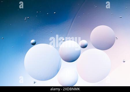 White and blue gradient on oil circles with an abstract background Stock Photo