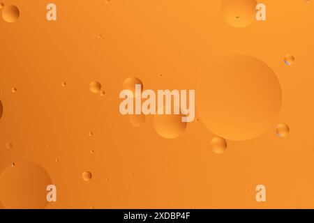 Abstract art featuring vibrant orange hues with bubble like forms Stock Photo