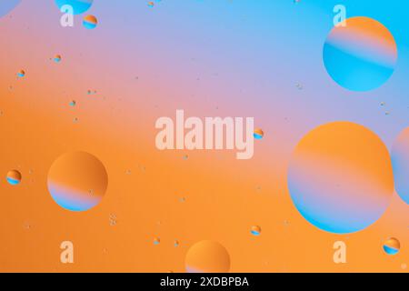 Abstract spheres floating on a gradient background Stock Photo