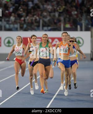 Femke Bol of the Netherlands and Sharlene Mawdsley of Ireland competing in the women’s 4x400m relay final at the European Athletics Championships, Sta Stock Photo