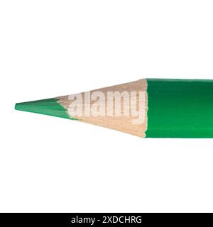 Close-up of the sharpened tip of a green colored pencil isolated on white background. Stock Photo