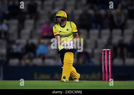 Southampton, UK. 21 June 2024. Benny Howell of Hampshire Hawks batting during the Vitality Blast match between Hampshire Hawks and Sussex Sharks at Utilita Bowl. Credit:Dave Vokes/Alamy Live News Stock Photo