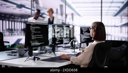 Software Engineer Developer Using Desktop Computer. Coding On PC Stock Photo