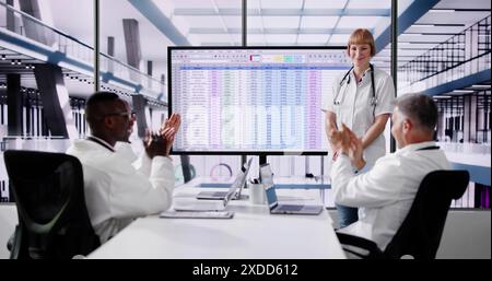 Doctor Showing Medical Codes Training Presentation In Hospital Stock Photo