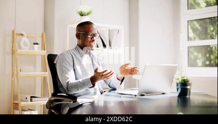Young Caucasian Woman Engaged in Online Virtual Secretary Training, Waving Goodbye in a Business Webinar. Professional Development for All Professions Stock Photo