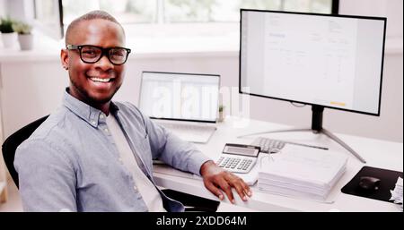 Efficient accountant using calculator for tax accounts at the wine director's desk in a corporate office. Collaboration for financial success. Stock Photo