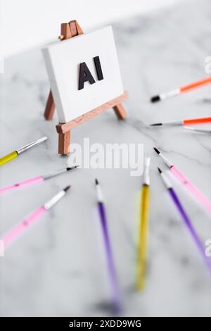 AI text on canvas on easel with brushed around it, art and machine learning concept, image NOT generated with AI Stock Photo