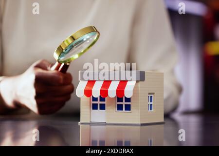 Local Woman Inspecting Property as Franchise Owner of Small Insurance Store in African American-Owned Business Concept Stock Photo