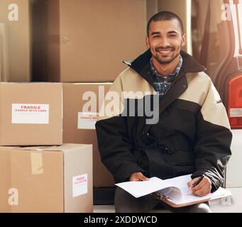Delivery man, smile and boxes in van for shipping, cargo or distribution with courier. Male person, happiness or cardboard container for logistics or Stock Photo