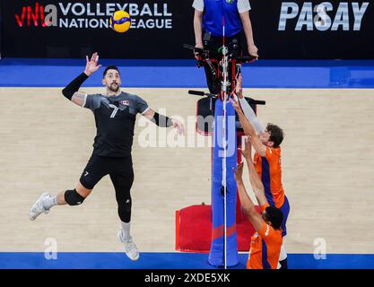 Pasay City, Philippines. 22nd June, 2024. Stephen Timothy Maar (L) of Canada spikes the ball during the match between Canada and the Netherlands at the Men's Volleyball Nations League (VNL) 2024 in Pasay City, the Philippines, on June 22, 2024. Credit: Rouelle Umali/Xinhua/Alamy Live News Stock Photo