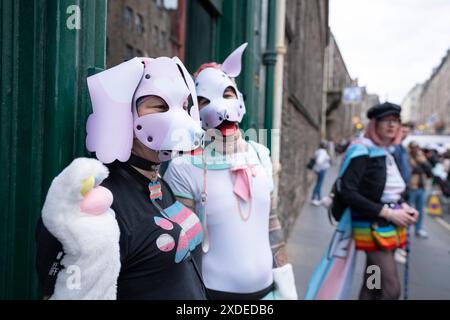 Edinburgh, Scotland, UK. 22nd June 2024. Edinburgh Pride March drew thousands of people to march from Scottish Parliament to a rally at Bristo square via the Royal Mile. The Pride march is an event during the Pride Month celebrations. Iain Masterton/Alamy Live News Stock Photo