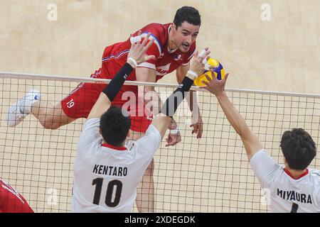 Pasay City, Philippines. 22nd June, 2024. Yacine Louati (top) of France spikes the ball during the match between Japan and France at the Men's Volleyball Nations League (VNL) 2024 in Pasay City, the Philippines, on June 22, 2024. Credit: Rouelle Umali/Xinhua/Alamy Live News Stock Photo