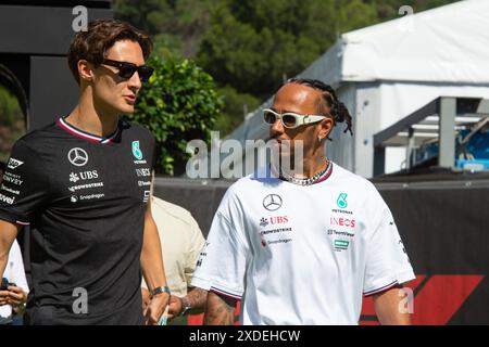 Barcelona, Spain. 22nd June, 2024. #44 Lewis Hamilton (GBR) together with his team mate George Russell MERCEDES-AMG PETRONAS F1 TEAM seen in the paddock of the F1 ARAMCO GRAND PRIX OF SPAIN 2024 from 21 to 24 of june @FOTO RACINGPICTURE during FORMULA 1 ARAMCO GRAN PREMIO DE ESPANA 2024 - Race, Formula 1 Championship in Barcelona, Spain, June 23 2024 Credit: Independent Photo Agency Srl/Alamy Live News Stock Photo