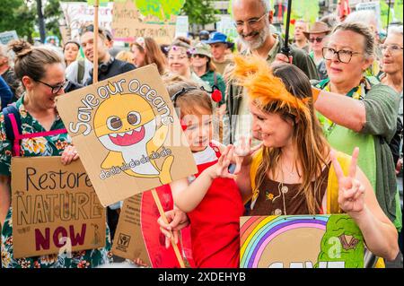 London, UK. 22nd June, 2024. Extinction Rebellion Restore Nature Now Demonstration - a legal, peaceful and inclusive public march and rally organised by XR and other environmental groups who are united in calling on all political parties to make this General Election the turning point for nature. Credit: Guy Bell/Alamy Live News Stock Photo