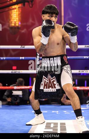 June 21, 2024: Top Rank Ring Girl Stephanie Ann Cook holds the NABO ...