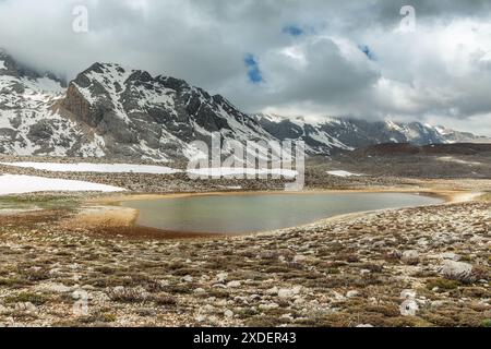 Temporary lakes formed in the spring months as snow melts in the higher parts of Antalya Taşeli Plateau. Stock Photo