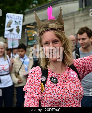 LONDON, UK. 22nd June, 2024. Restore nature now: We are climate voter march - The greatest damage to nature is caused by wars, invasions, and the deliberate destruction of the planet, not climate change, so restore nature immediately. in London, UK Credit: See Li/Picture Capital/Alamy Live News Stock Photo
