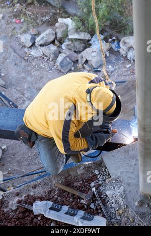 Mexican construction workers cement pouring concrete Stock Photo