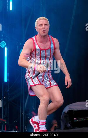 Newport, UK. 22nd June, 2024. American musician Jason Sellards, known professionality by stage name Jake Shears, best known as co-lead singer with the Scissor Sisters, performing live on stage at the Isle of Wight festival. Credit: SOPA Images Limited/Alamy Live News Stock Photo