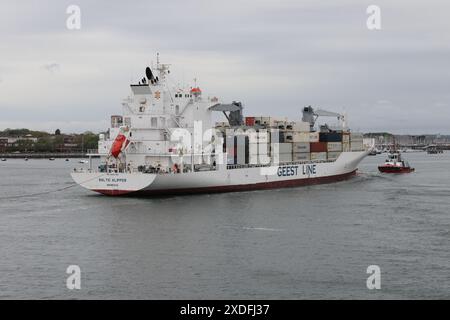 The refrigerated cargo ship MV BALTIC KLIPPER heading up harbour towards the international port terminal Stock Photo