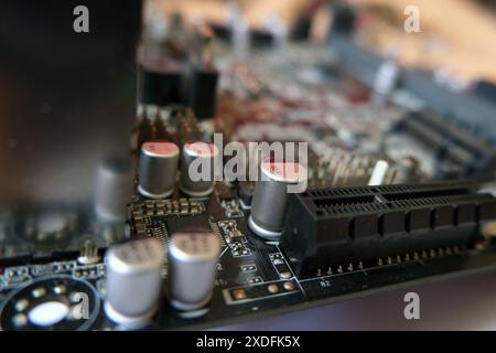 High technology electronic. Micro electronic on the board. Focused on capacitors. Stock Photo