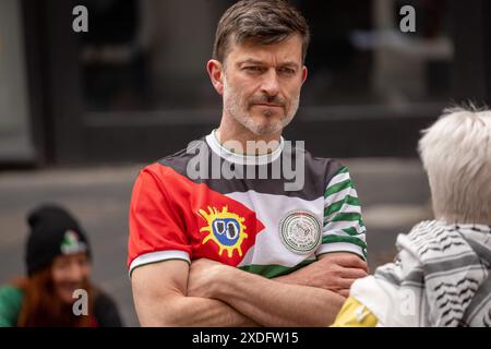 Glasgow, Scotland, UK. 22nd June, 2024. Pro Palestine supporters take part in a Cycle for Palestine ride from the BBC to the Steps at the Buchannan Galleries to highlight the ongoing war in Gaza and to demand a ceasefire. Credit: R.Gass/Alamy Live News Stock Photo