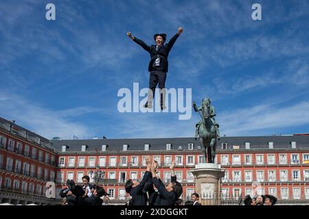 Madrid, Spain. 22nd June, 2024. A group of young Japanese people from 'Cheers Re-Man's' perform a surprise performance in the Plaza Mayor of Madrid. Credit: SOPA Images Limited/Alamy Live News Stock Photo