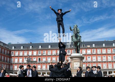 Madrid, Spain. 22nd June, 2024. A group of young Japanese people from 'Cheers Re-Man's' perform a surprise performance in the Plaza Mayor of Madrid. Credit: SOPA Images Limited/Alamy Live News Stock Photo