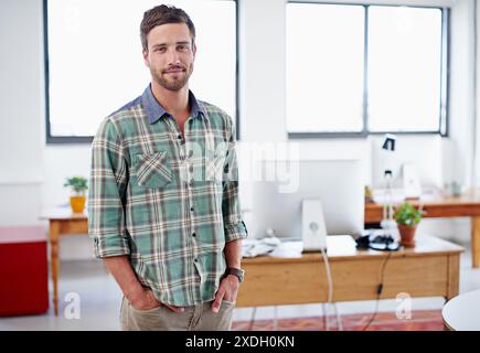 Portrait, creative and business man at startup for career, job or work at company in Germany. Face, confident and professional entrepreneur, employee Stock Photo
