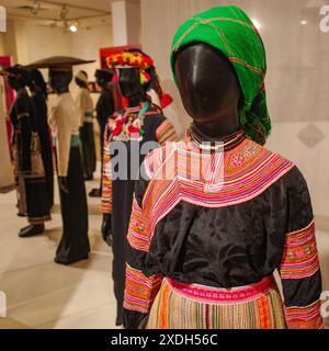 Hanoi, Vietnam - 29 Jan, 2024: Traditional textiles and dresses on display at the Vietnames Womens Museum, Hanoi Stock Photo