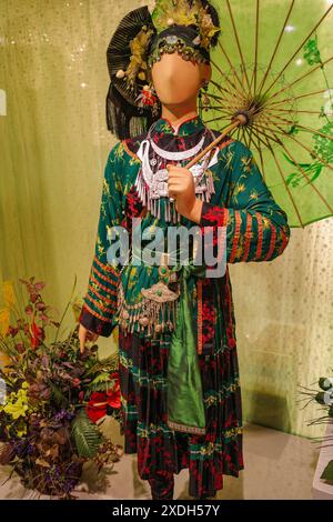 Hanoi, Vietnam - 29 Jan, 2024: Traditional textiles and dresses on display at the Vietnames Womens Museum, Hanoi Stock Photo