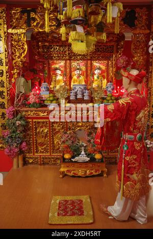 Hanoi, Vietnam - 29 Feb, 2024: Traditional shrine exhibit at the Vietnamese Womens Museum, Hanoi Stock Photo