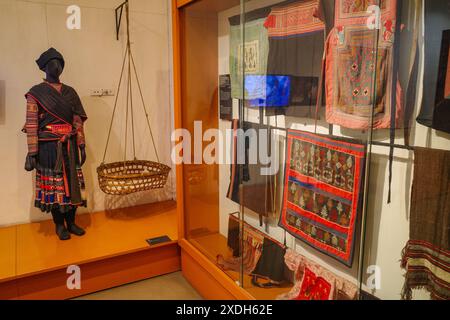 Hanoi, Vietnam - 29 Jan, 2024: Traditional textiles and dresses on display at the Vietnames Womens Museum, Hanoi Stock Photo