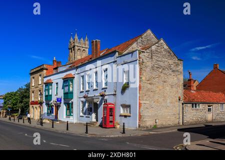 A mix of interesting and colourful architecture on the High Street in Glastonbury, Somerset, England, UK Stock Photo