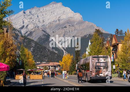 Banff, Alberta, Canada - October 06 2022 : Roam Public Transit Banff Local Route Bus on Banff Avenue. Stock Photo